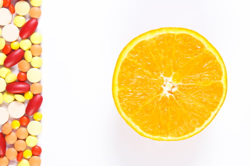Preview: Colorful Medical Pills, Tablets, Capsules Or Supplements And Fresh Orange, Concept Of Treatment