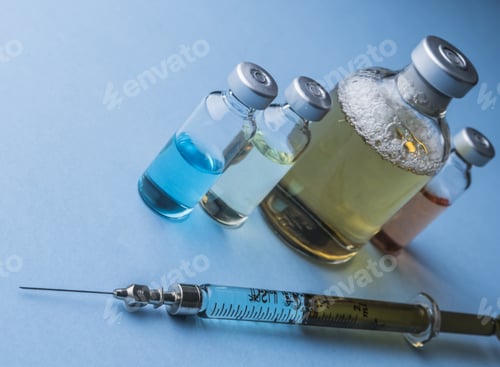 Preview: Several Vials And Syringe In Laboratory, Conceptual Image