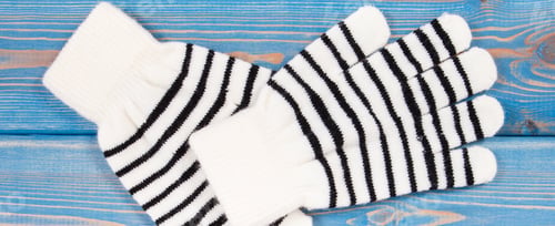 Preview: Black And White Gloves For Woman Made Of Cotton Or Wool On Blue Boards, Warm Clothing For Autumn Or