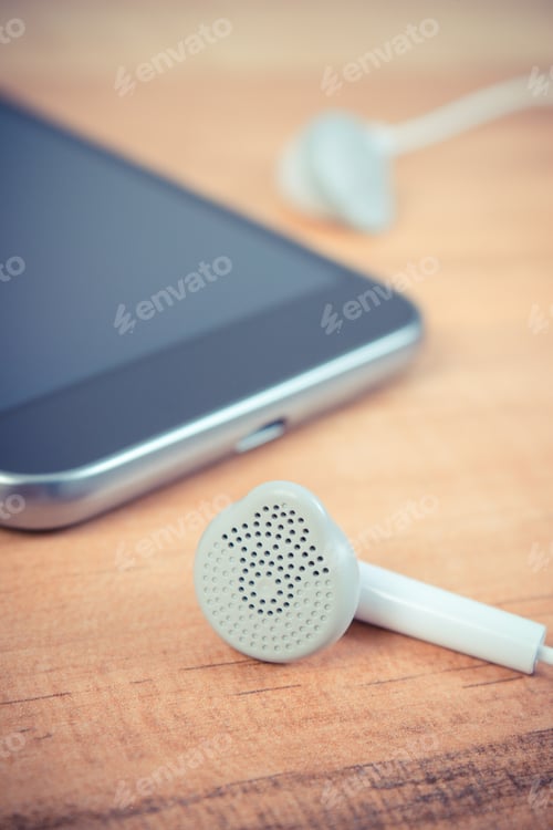 Preview: Vintage Photo, Mobile Phone, Smartphone With Headphones On Wooden Table