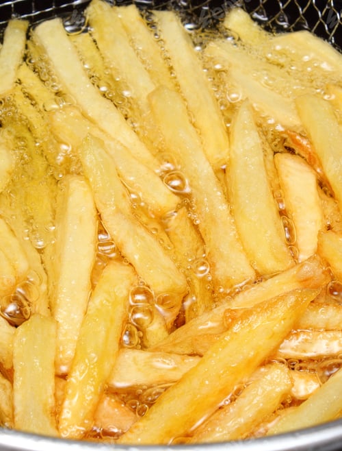 Preview: Heap Of French Fries Fried In Oil, Deep Fried, Unhealthy And Caloric Food.
