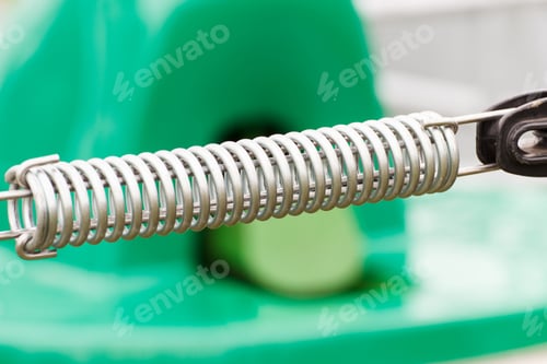 Preview: Steel Spring On Industrial Or Agricultural Machinery, Detail And Part Of Hydraulic Or Pneumatic