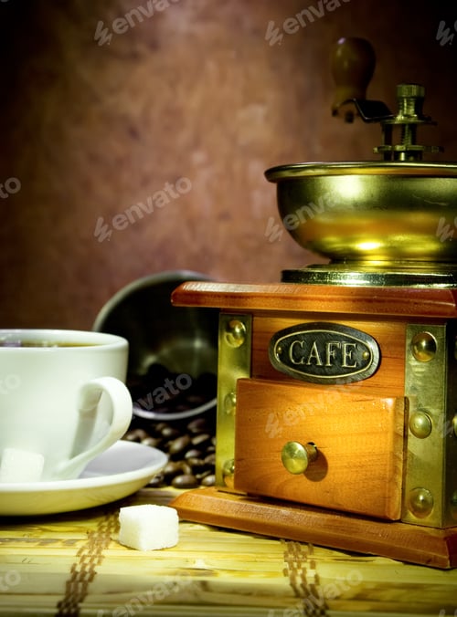 Preview: Cup Full Of Coffee, Beans, Pot And Grinder In Night