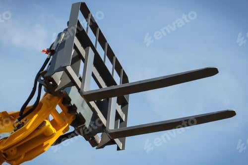 Preview: Part And Detail Of Forklift Loader Or Stacker On Blue Sky Background. Modern Technology