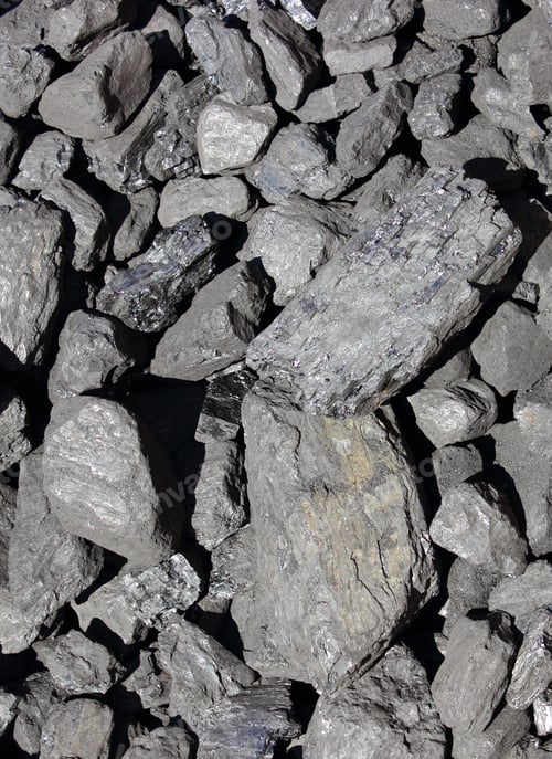Preview: Heap Of Large And Black Coal Lumps Prepared For Winter In Sunny Day