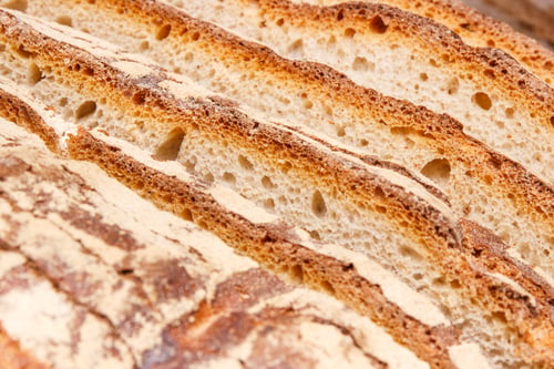 Preview: Slices Of Fresh Baked Crusty Traditional Loaf Of Rye Or Wheat Bread