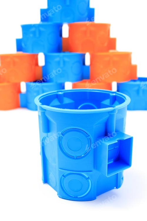 Preview: Blue And Orange Plastic Electrical Boxes On White Background, Components For Use In Electrical