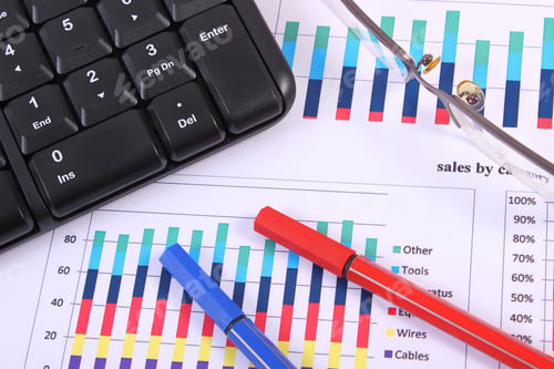 Preview: Pen, Glasses And Computer Keyboard On Financial Chart, Business Concept, Analysis Of Sales Plan