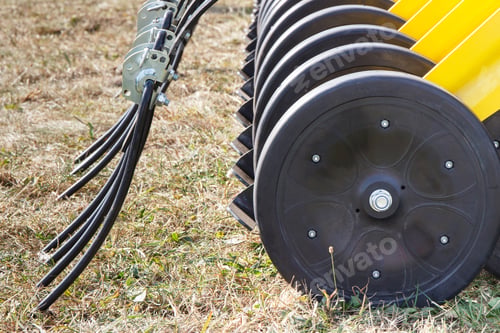 Preview: Part And Detail Of Agricultural Rotary Harrow On Cultivated Field. Modern Technology In Agriculture