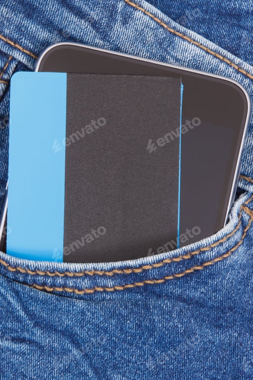 Preview: Credit Card And Smartphone In Front Jeans Pocket. Concept Of Cashless Payment
