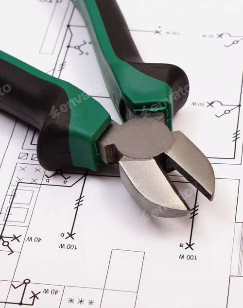 Preview: Metal Pliers On Electrical Construction Drawing Of House, Work Tool And Drawing For Projects