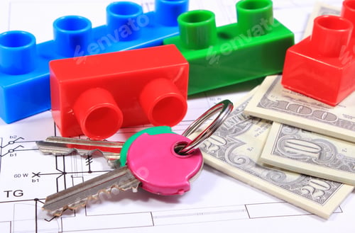 Preview: Heap Of Banknotes, Home Keys And Plastic Colorful Building Blocks Lying On Construction Drawing Of