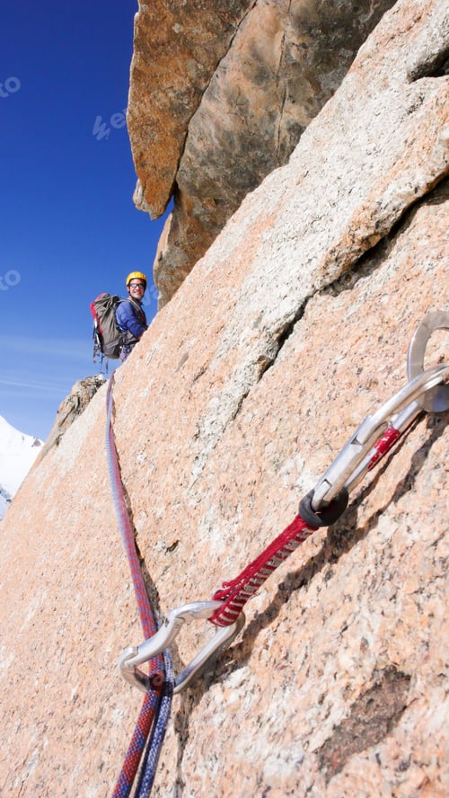 Preview: Man Rock Climbing A Steep Vertical Granite Rock Climbing Route In The French Alps Near Mont Blanc