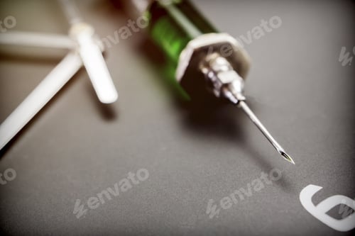 Preview: A Syringe On A Clock In Laboratory, Conceptual Image