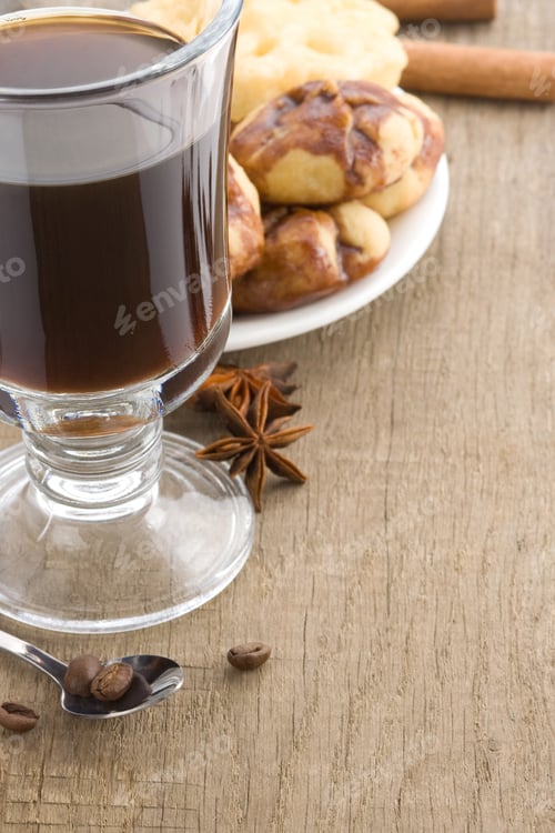 Preview: Cup Of Coffee And Sweets On Wood Background Texture