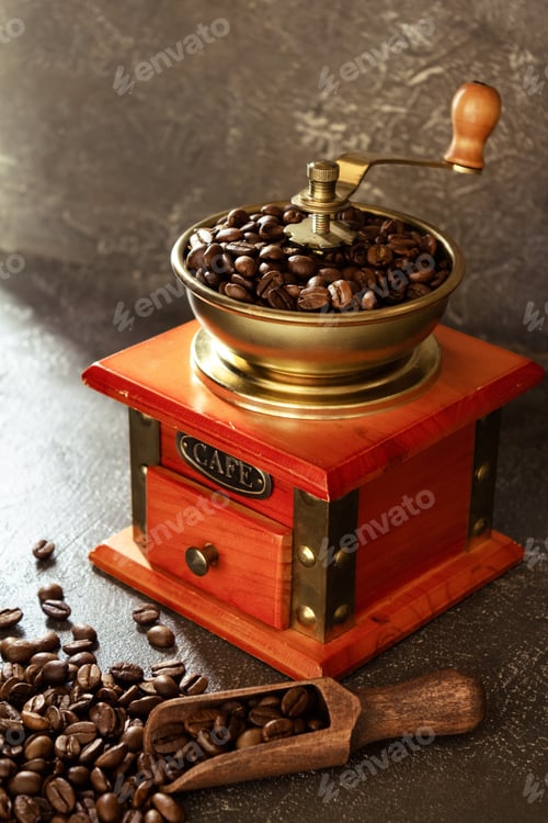 Preview: Old Vintage Coffee Grinder And Beans At Table Background Texture