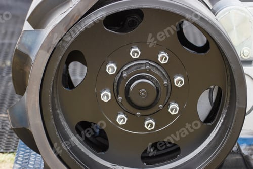 Preview: Detail And Part Of Metal Wheel With Caterpillar. Transportation And Technology Concept