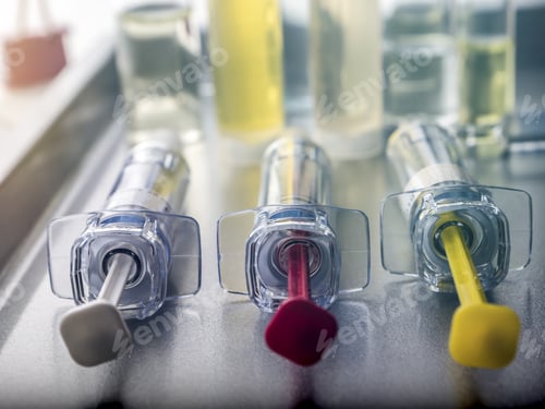 Preview: Several Vials And Syringe In Laboratory, Conceptual Image