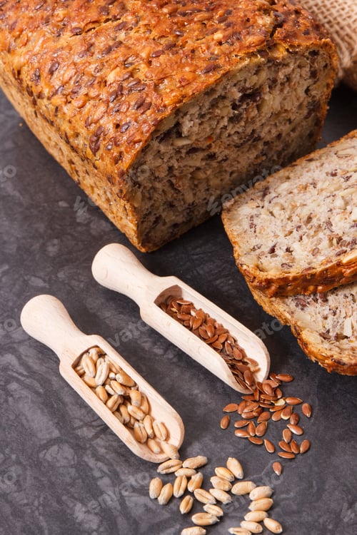Preview: Fresh Baked Wholegrain Bread With Ingredients For Baking