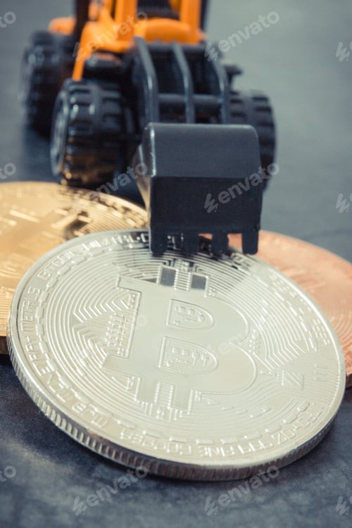Preview: Silver Bitcoin Coins With Miniature Excavator, Concept Of Mining Cryptocurrency And Modern Finance