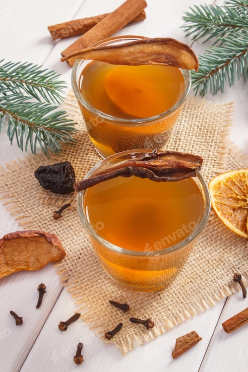 Preview: Green Spruce Branches And Cup Of Traditional Compote Of Dried Fruits For Christmas, Healthy