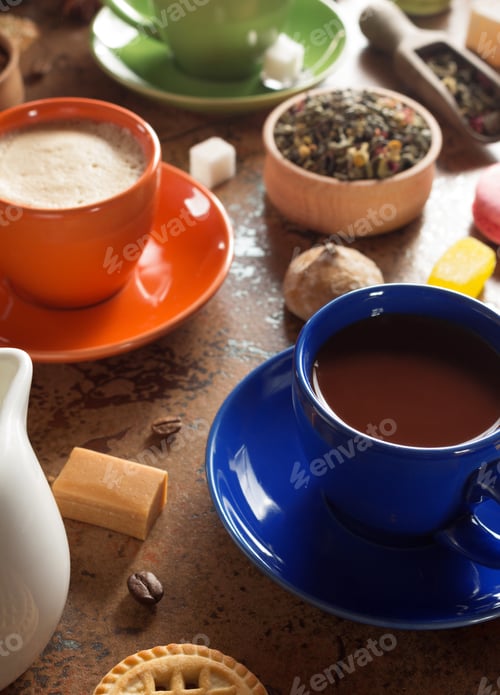 Preview: Cup Of Cacao And Coffee At Table Surface