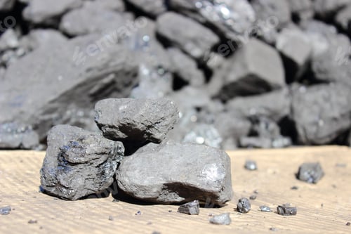 Preview: Closeup Of Coal Lump On A Background Of Solid Carbon Stack
