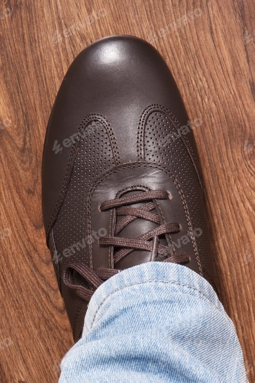 Preview: Brown Comfortable Shoes For Men On Rustic Board, Concept Of Male Footwear