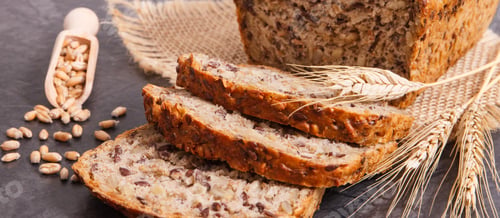 Preview: Fresh Baked Wholegrain Bread For Breakfast And Ears Of Rye Or Wheat Grain