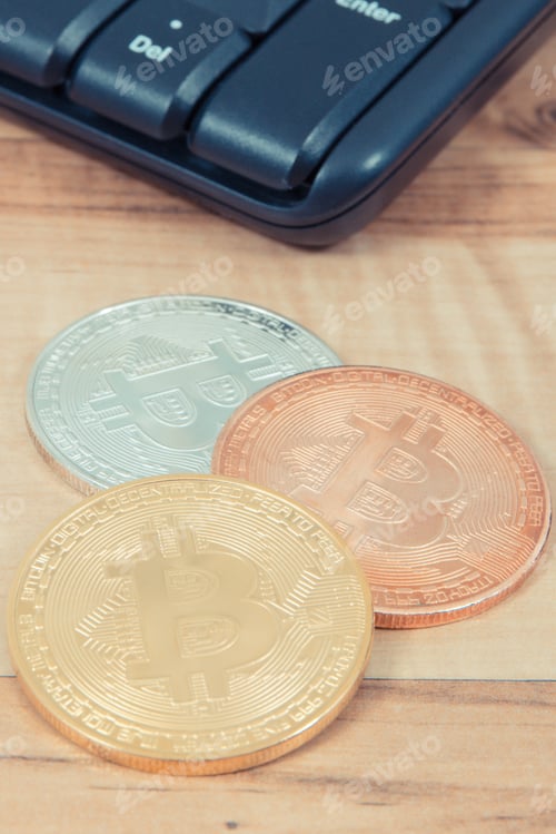 Preview: Bitcoins And Compuer Keyboard In Background, Symbol Of Electronic Virtual Money And Mining