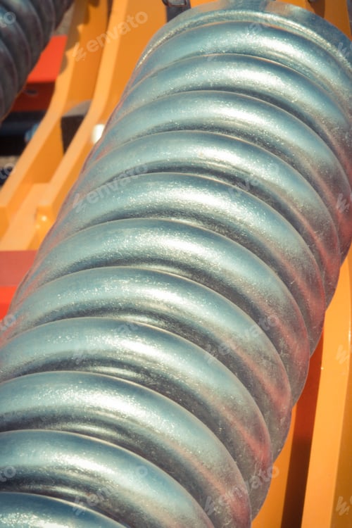 Preview: Steel Spring In Industrial Or Agricultural Machinery. Part And Detail Of Hydraulic Or Pneumatic