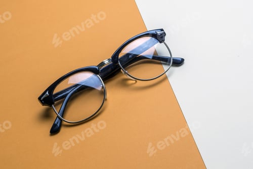 Preview: Vintage Eyeglasses with Black Frame on Two-Tone Background