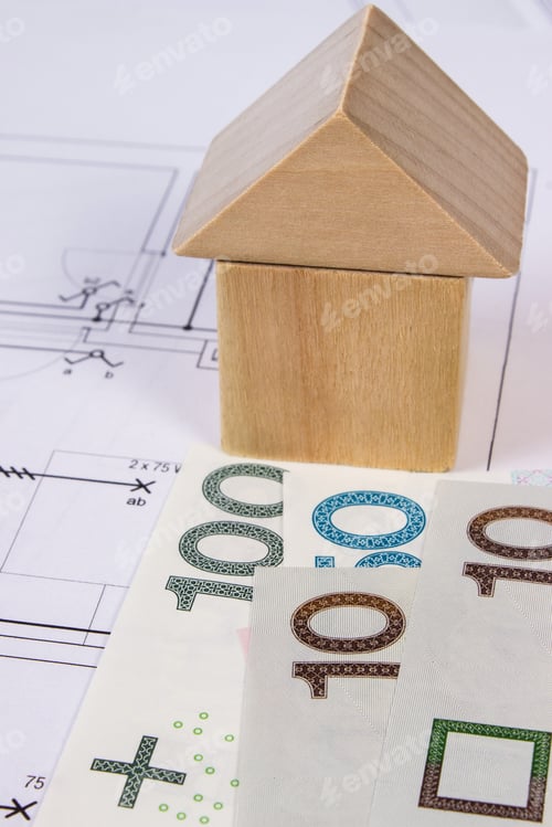 Preview: House Shape Made Of Wooden Blocks And Polish Currency Money On Electrical Construction Drawings Of