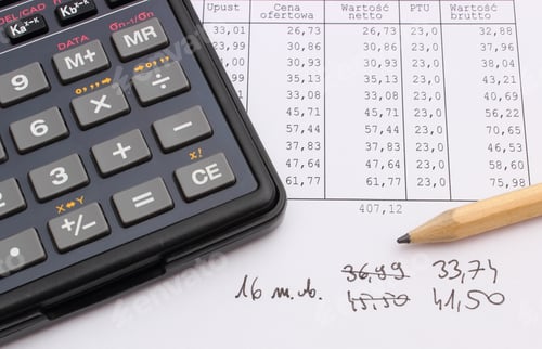 Preview: Closeup Of Pencil And Calculator On Spreadsheet