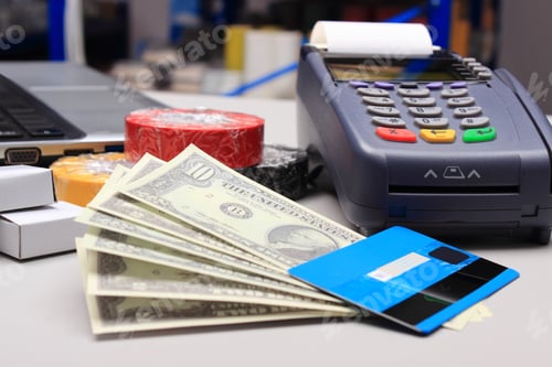 Preview: Money And Payment Terminal With Credit Card In An Electrical Shop, Paying For Shopping, Finance