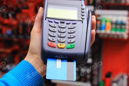 Preview: Hand Of Woman Using Payment Terminal In An Electrical Shop, Paying With Credit Card, Credit Card
