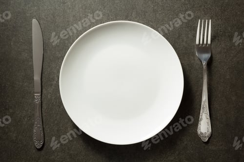 Preview: Plate, Knife And Fork On Dark Background