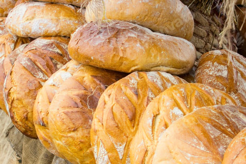 Preview: Heap Of Freshly Baked Traditional Loaves Of Rye Bread On Stall At The Bazaar