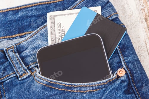 Preview: Credit Card, Currencies Dollar And Smartphone In Front Jeans Pocket. Concept Of Cashless Or Cash