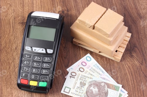 Preview: Payment Terminal, Polish Currency Money And Small Wrapped Boxes On Wooden Pallet, Concept Of Paying