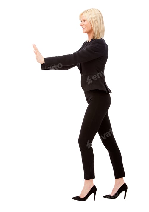 Preview: Business Woman Pushing Something Isolated Over A White Background