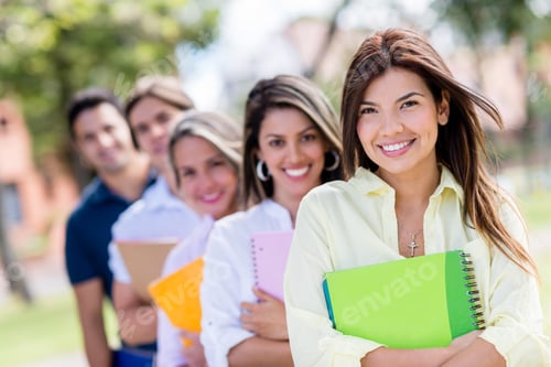 Preview: Happy Group Of Casual Students Smiling At The Park