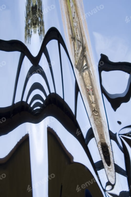 Preview: Abstract Iron Railing, Yard, And Sky