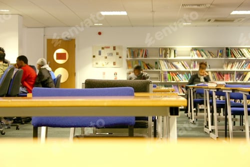 Preview: Students Studying At A Library