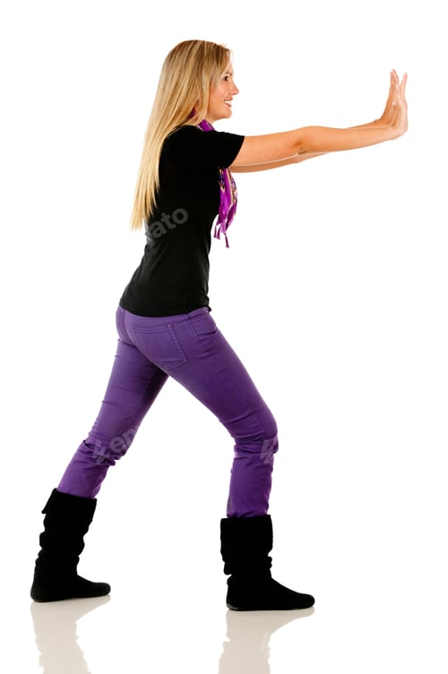 Preview: Woman Pushing Against The Wall - Isolated Over A White Background