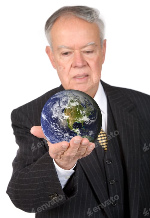 Preview: Business Man Holding A Globe Over A White Background - Globe Is From Http://Www.Nasa.Gov