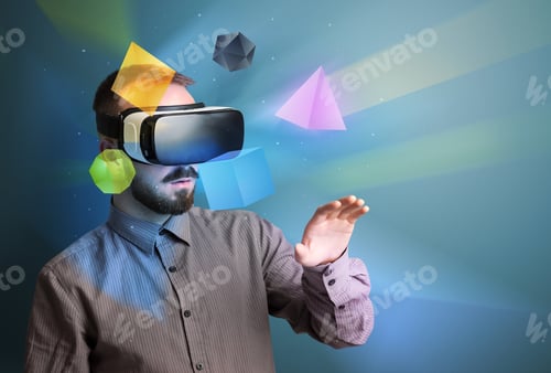 Preview: Amazed Businessman With Virtual Reality Colorful Geometric Shapes In Front Of Him