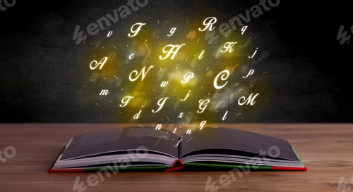 Preview: Glowing Yellow Alphabet Letters Coming Out Of An Open Book