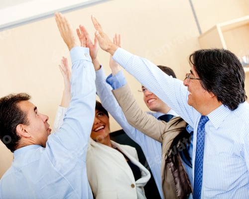 Preview: Successful Business Group Giving A High-Five At The Office