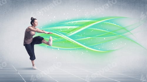 Preview: A Good Looking Fresh Street Dancer Dancing In Front Of Grey Background With White And Bright
